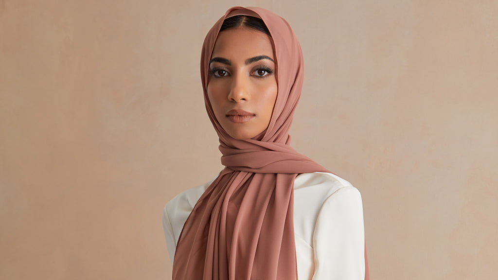 A woman in everyday modest dress, soft morning light