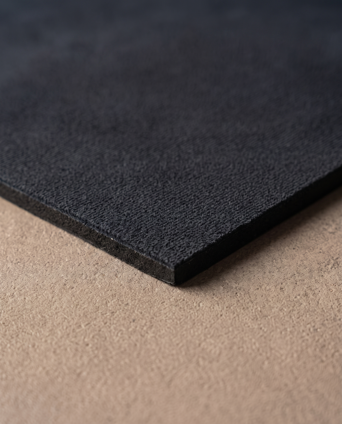 Obsidian Prayer Mat — edge: sueded fabric on dense rubber base